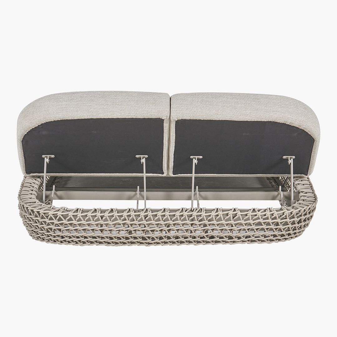 Sun lounger with storage outlet